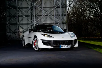 White Lotus Evora Cars Wallpaper 4K 4096x2733 White, Lotus, Evora, Supercar, Parked, Outdoors, Showcased, In, Sharp, Ultra, Detail, Against, Landscape, 4k