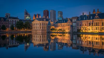 Night Hague Cityscape Illuminated Historic World Wallpaper 4K 1920x1080 Night, View, Of, The, Hague, Cityscape, With, Illuminated, Historic, Modern, Buildings, Reflecting, Brown, Ultrawide, Full HD