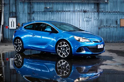 Blue Opel Astra Cars Wallpaper 4K 4096x2731 A, Blue, Opel, Astra, Compact, Car, Is, Parked, Indoors, Wet, Surface, Reflection, Gray, Landscape, 4k