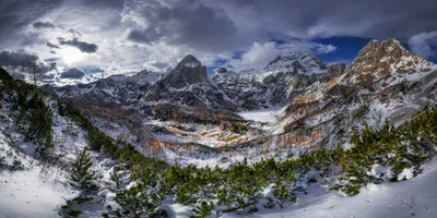 Serene Snow Wallpaper Nature Wallpaper 4K 2500x1255 Snow-covered, Mountain, Peaks, Rise, Under, Dramatic, Clouds, In, Winter, Landscape, Showcasing, Nature, Gray, Ultrawide, Full HD