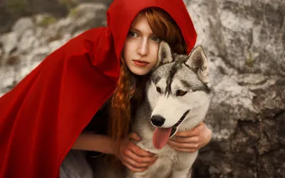 Woman Vibrant Red Cloak Poses Animals Wallpaper 4K 1920x1200 A, Woman, In, Vibrant, Red, Cloak, Poses, Husky, Dog, Against, Rocky, Backdrop, Brown, Ultrawide, Full HD
