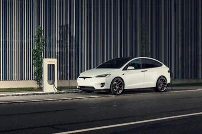 White Model Electric Car Cars Wallpaper 4K 4096x2731 White, Tesla, Model, X, Electric, Car, Charging, At, Station, Against, Striped, Industrial, Gray, Landscape, 4k