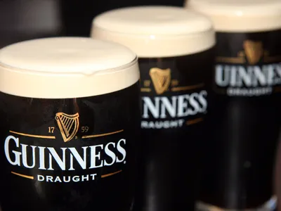 Serene Three Wallpaper Black/Dark Wallpaper 4K 1600x1200 Three, Glasses, Of, Guinness, Draught, Beer, Showcasing, The, Iconic, Black, Design, Creamy, White, Landscape
