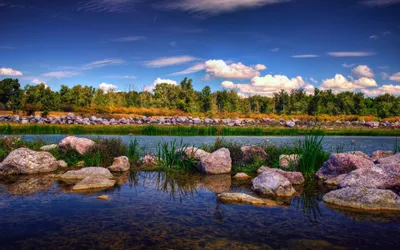 Tranquil Lake Smooth Rocks Nature Wallpaper 4K 3840x2400 A, Tranquil, Lake, Scene, Featuring, Smooth, Rocks, And, Lush, Greenery, Under, Blue, Brown, Ultrawide, 4k