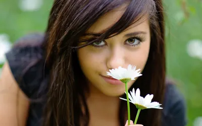 Woman Dark Hair Holds Black/Dark Wallpaper 4K 1920x1200 A, Woman, With, Dark, Hair, Holds, White, Daisy, Close, Her, Face, Gazing, Brown, Ultrawide, Full HD