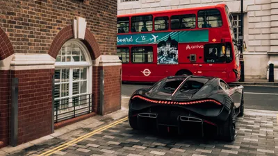 Black Tourbillon Hypercar City World Wallpaper 4K 3240x1823 Rear, View, Of, A, Black, Bugatti, Tourbillon, Hypercar, Parked, City, Street, Beside, Brown, Gray, Ultrawide, QHD