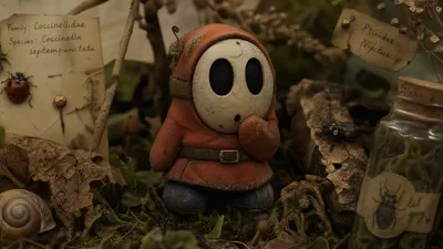 Shy Guy Figurine Abstract Wallpaper 4K 3840x2160 Shy, Guy, Figurine, Tucked, In, Moss, And, Leaves, Hand, Face, Beside, Handwritten, Gray, Brown, Ultrawide, 4K