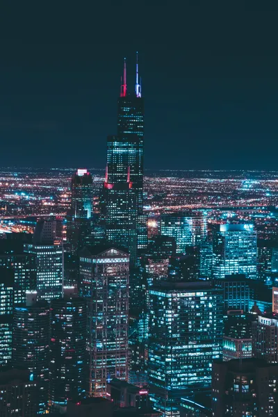 City Skyline During Night Time World Wallpaper 4K 5440x8160 Brown, Gray