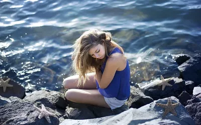 Dark Young Wallpaper Space Wallpaper 4K 1680x1050 A, Young, Woman, Sits, On, Rocks, By, The, Water, Wearing, Blue, Top, White, Brown, Ultrawide