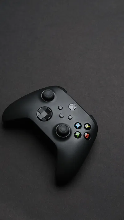 Sleek Black Gaming Controller Backdrop Wallpaper 4K, Minimal category