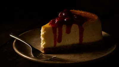 Moody Cherry Wallpaper Black/Dark Wallpaper 4K 3840x2160 Cherry-topped, Cheesecake, Slice, On, A, Plate, With, Fork, Low, Light, Rich, Texture, Orange, Black, Brown, Ultrawide, 4K