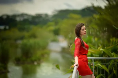 Brunette Woman Red Dress Lipstick Abstract Wallpaper 4K 2000x1331 A, Brunette, Woman, In, Red, Dress, And, Lipstick, Stands, Railing, Blurred, Natural, White, Ultrawide, Full HD