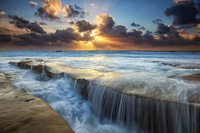 Dramatic Ocean Waves Cascading Rocks Wallpaper 4K, Nature category