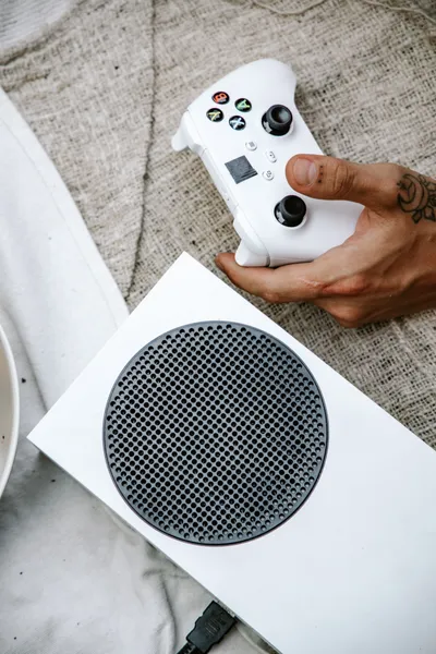 Person Holding Game Console Controller Wallpaper 4K, Games category