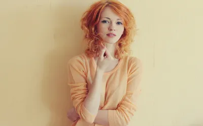 Woman Curly Orange Hair Poses Abstract Wallpaper 4K 2560x1600 A, Woman, With, Curly, Orange, Hair, Poses, Thoughtfully, Against, Soft, Yellow, Wall, White, Ultrawide, QHD