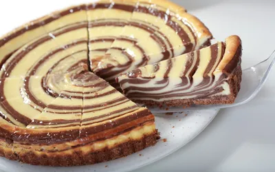 Delicious Swirled Cheesecake Chocolate Creamy Abstract Wallpaper 4K 1920x1200 A, Delicious, Swirled, Cheesecake, With, Chocolate, And, Creamy, Layers, Served, Plate, Slice, White, Ultrawide, Full HD