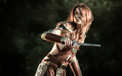 Golden Fierce Wallpaper Abstract Wallpaper 4K 1920x1200 A, Fierce, Woman, In, Elaborate, Cosplay, Poses, With, Sword, Showcasing, Her, Detailed, White, Brown, Ultrawide, Full HD