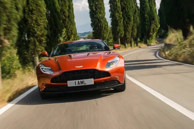 Sleek Orange Wallpaper Nature Wallpaper 4K 4096x2733 A, Striking, Orange, Aston, Martin, Db11, Grand, Tourer, Navigates, Winding, Road;, Embodying, Gray, Landscape, 4K