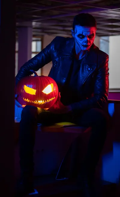 Man Halloween Makeup Holding Pumpkin Abstract Wallpaper 4K 3408x5604 Gray