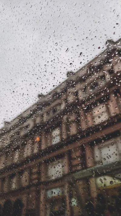 Raindrops Window Building Behind World Wallpaper 4K 2268x4032 White