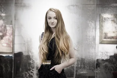 Stylish Sophie Turner Stands Abstract Wallpaper 4K 2272x1515 A, Stylish, Sophie, Turner, Stands, Confidently, In, Sleek, Outfit, Surrounded, Softly, Blurred, White, Landscape, Full HD