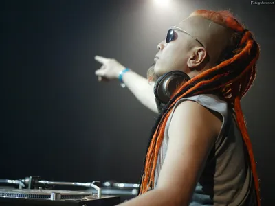 Serene Orange Wallpaper Technology Wallpaper 4K 1600x1200 Dj, With, Orange, Dreadlocks, And, Sunglasses, Pointing, Into, Distance, While, Wearing, Headphones, White, Gray, Landscape