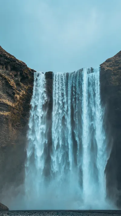 Majestic Skogafoss Waterfall Nature Wallpaper 4K 3368x6000 Gray
