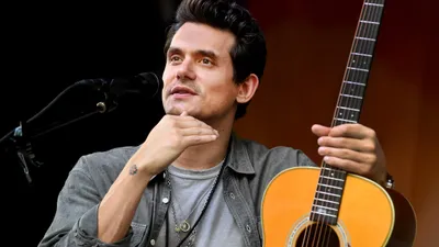 Close John Mayer Performing Abstract Wallpaper 4K 2560x1440 A, Close-up, Of, John, Mayer, Performing, With, His, Acoustic, Guitar, Showcasing, Expressive, Orange, Purple, Ultrawide, QHD