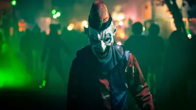Dark Eerie Clown Emerges Foggy Black/Dark Wallpaper 4K 5000x2813 A, Dark, Eerie, Clown, Emerges, From, Foggy, Scene, Surrounded, Blurred, Figures, Creating, White, Gray, Ultrawide, 4k