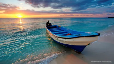 Boat Rests Shore Tranquil Nature Wallpaper 4K 2560x1440 A, Boat, Rests, On, The, Shore, Of, Tranquil, Ocean, Sunset, Casting, Serene, Gray, Ultrawide, QHD