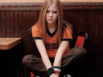Definition Avril Lavigne Nature Wallpaper 4K 1920x1440 A, High-definition, Desktop, Wallpaper, Featuring, Avril, Lavigne, Seated, Serious, Expression, Dressed, Orange, Gray, White, Landscape, Full HD