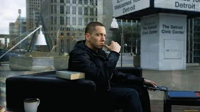 Contemplative Eminem Sits Sofa World Wallpaper 4K 1920x1080 A, Contemplative, Eminem, Sits, On, Sofa, In, Urban, Setting, Reflecting, His, Music, Gray, Ultrawide, Full HD