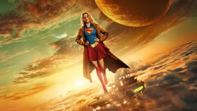 Vivid Supergirl Wallpaper Space Wallpaper 4K 5120x2880 Supergirl, (2026), Soars, Above, Golden, Clouds, Toward, A, Distant, Planet, Cape, White, Orange, Ultrawide, 4k