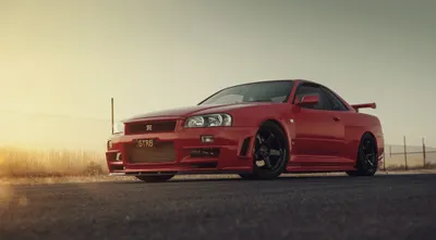 Vibrant Red Wallpaper Nature Wallpaper 4K 2047x1129 Red, Nissan, Skyline, R34, Parked, On, A, Road, Sunset, Captured, Desktop, Showcasing, Gray, Ultrawide, Full HD